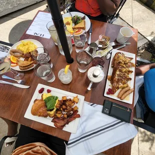 Banana Bourbon French Toast, Croissant Sandwich, Two eggs, Omelette