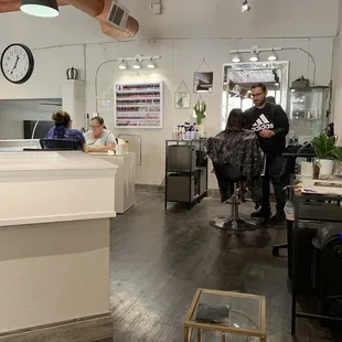 Upstairs - Owner Rafael and Wendy manicurist