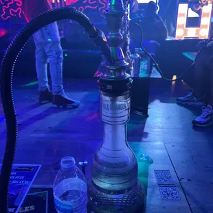 a hookah bar with neon lights