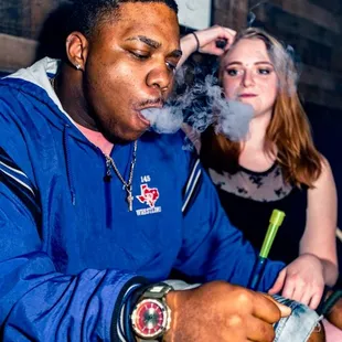 a man smoking a cigarette