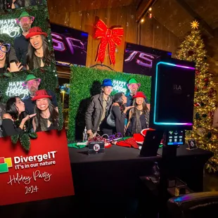 Artificial Greenery Photobooth with Happy Holidays NEON sign