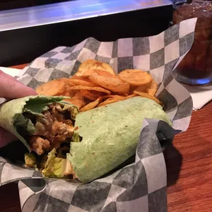 Defending champ chicken wrap in buffalo blue sauce and chips