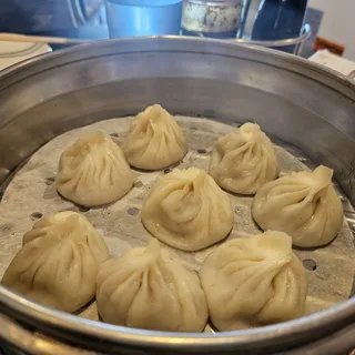 A1. Juicy Pork Steamed Dumplings
