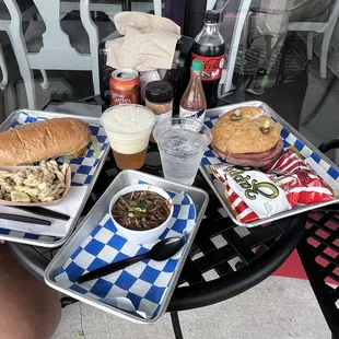 Our spread. Shrimp, Poboy, chicken, gumbo, and muffaletta.