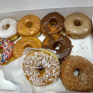 Half eaten box of donuts