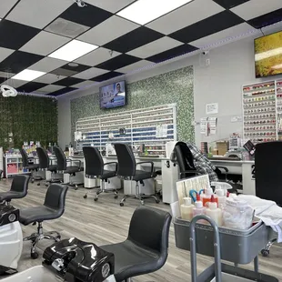Nail salon w/ many pedicure chairs
