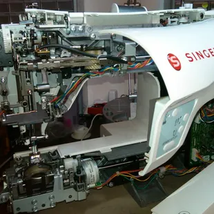 Modern computerized Singer sewing machine in service