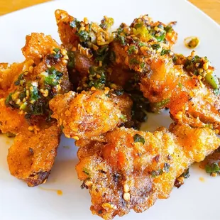 A25. legs and wings with Garlic &amp; Spicy - not spicy at all but perfectly crispy