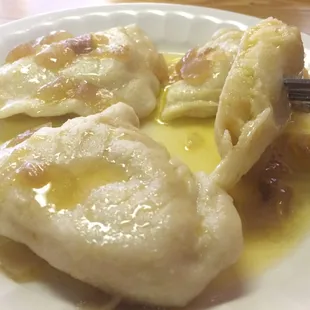 Pierogi in a lot of butter.