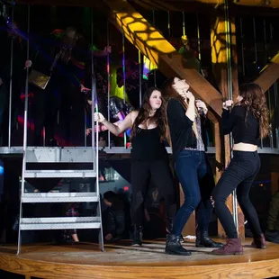 a group of people performing on a stage