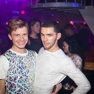 two young men posing for the camera