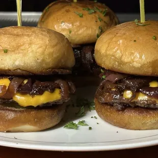 three burgers on a plate