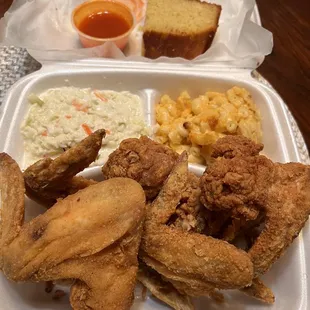 Whole wings Mac n cheese cornbread coleslaw and hotsauce