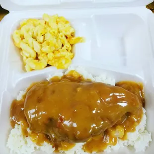 Smothered Chicken Breast with macaroni and cheese
