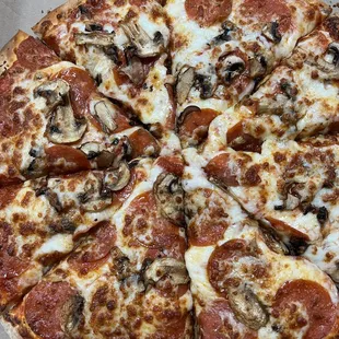 Pepperoni and mushroom pizza