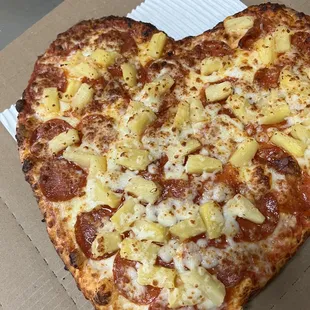 pepperoni and pineapple heart shape