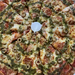 Pair your pepperoni pizza with green olives and pesto sauce#lwpizza