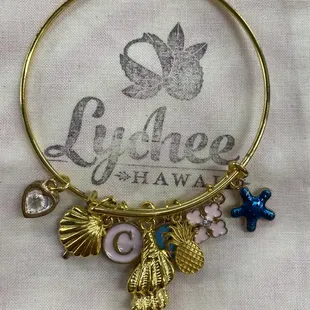 Shake, shake, shake this unique piece designed by you! A perfect Hawaiian keepsake.