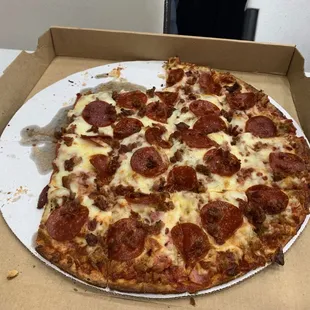 The PigSkin - Stromboli meat, Italian sausage, ham, pepperoni, bacon, and mozzarella cheese