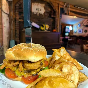 a sandwich and chips on a plate