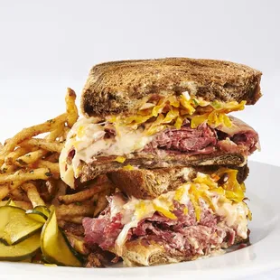 a corned beef sandwich and french fries