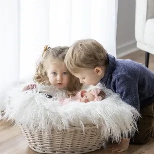 Newborn session with family in the studio with window light is easy and beautiful!