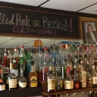 Ron Jeremy photo proudly displayed behind bar.