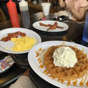 Daily special caramel pecan waffle with included sides of thick cut bacon and eggs.  $12.99!