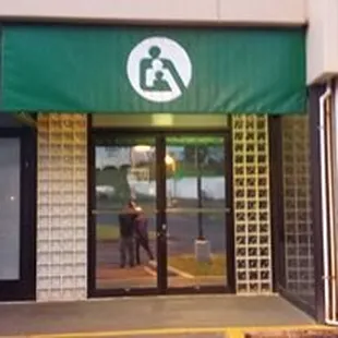 Green Awning with Logo