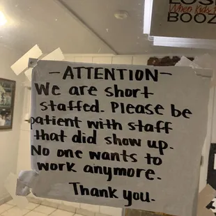 a sign on the door of a restaurant
