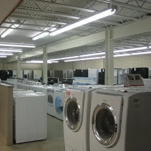 The back room at Lytton's Appliance - showcasing microwaves, ranges, washer/dryers, refrigerators and more