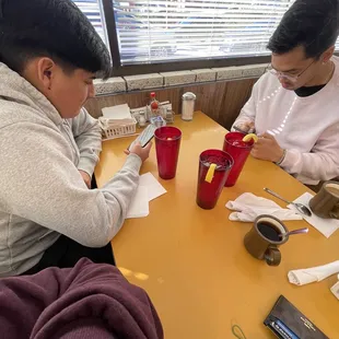 two people sitting at a table