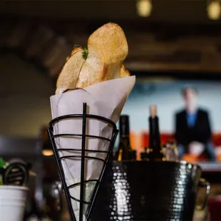 a basket of breadsticks