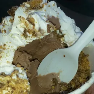 Yum! Peanut butter cups and chocolate ice cream sundae.