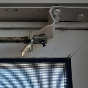 This is not how you install a door closer, hanging from the pin tines