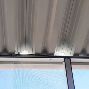 Foam plugs blown out all along roofline. They are supposed to butter the edges with adhesive, so they actually stay in place