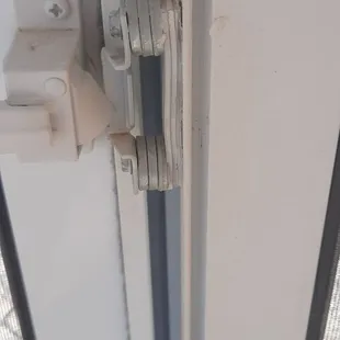 I replaced the thick stacks of scrap shims for the door latches