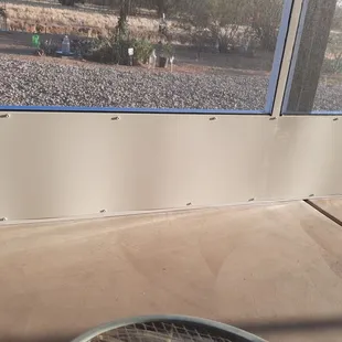 Larger view of the wavy kickplate with daylight showing thru