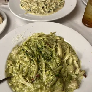 Chicken fettuccine pesto and linguine and clams