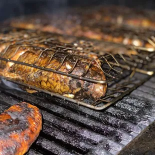 a hot dog on a grill