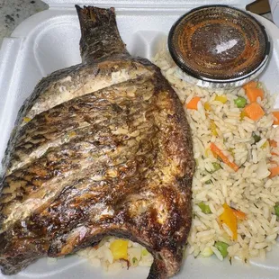 JERK FISH and a coconut vegetable rice.