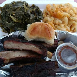 Rib dinner. Delicious!  Collard greens stole the show.