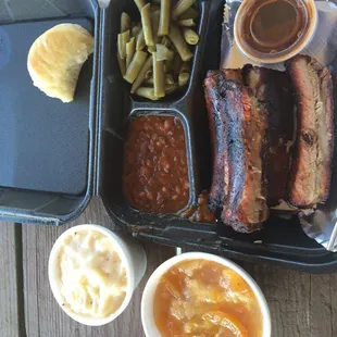 Pork ribs, green beans, baked beans, mashed potatoes with cream gravy, and peach cobbler. Amazing!