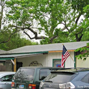 cars parked in front of a building