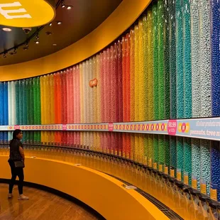 Silos of rainbow colored M&amp;m's.