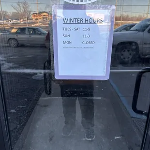 Front door with hours