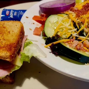 Half sandwich and salad