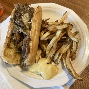 Cheesesteak and fries, still hot when we got it home 15 min later