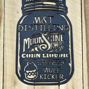 a mason jar on a wooden wall