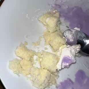 a white plate with purple food